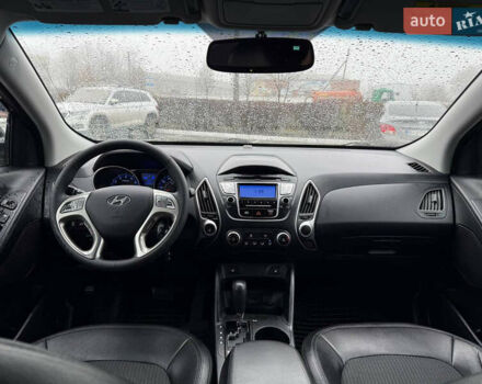 Черный Хендай Туксон, объемом двигателя 2.4 л и пробегом 143 тыс. км за 12000 $, фото 14 на Automoto.ua