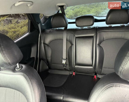 Черный Хендай Туксон, объемом двигателя 2.4 л и пробегом 143 тыс. км за 12000 $, фото 19 на Automoto.ua