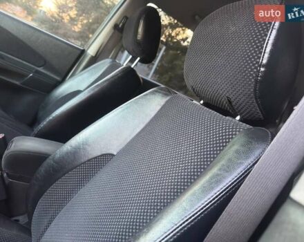 Черный Хендай Туксон, объемом двигателя 1.98 л и пробегом 140 тыс. км за 9671 $, фото 29 на Automoto.ua