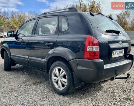 Черный Хендай Туксон, объемом двигателя 1.98 л и пробегом 158 тыс. км за 8200 $, фото 17 на Automoto.ua