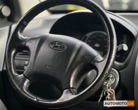 Черный Хендай Туксон, объемом двигателя 2 л и пробегом 178 тыс. км за 9600 $, фото 12 на Automoto.ua