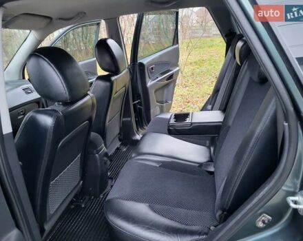 Чорний Хендай Туксон, об'ємом двигуна 1.98 л та пробігом 160 тис. км за 10300 $, фото 85 на Automoto.ua