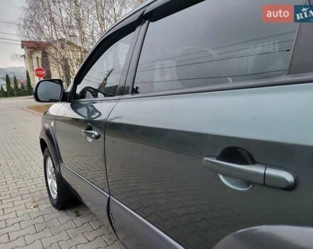 Чорний Хендай Туксон, об'ємом двигуна 1.98 л та пробігом 160 тис. км за 10300 $, фото 117 на Automoto.ua