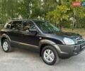 Черный Хендай Туксон, объемом двигателя 1.98 л и пробегом 140 тыс. км за 9671 $, фото 3 на Automoto.ua