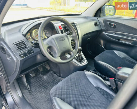 Черный Хендай Туксон, объемом двигателя 2 л и пробегом 119 тыс. км за 9600 $, фото 24 на Automoto.ua
