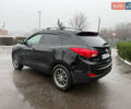 Черный Хендай Туксон, объемом двигателя 2.4 л и пробегом 143 тыс. км за 12000 $, фото 11 на Automoto.ua