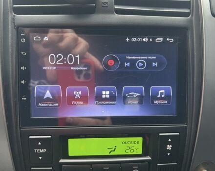 Черный Хендай Туксон, объемом двигателя 2 л и пробегом 181 тыс. км за 11000 $, фото 6 на Automoto.ua