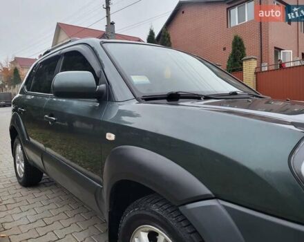 Чорний Хендай Туксон, об'ємом двигуна 1.98 л та пробігом 160 тис. км за 10300 $, фото 124 на Automoto.ua