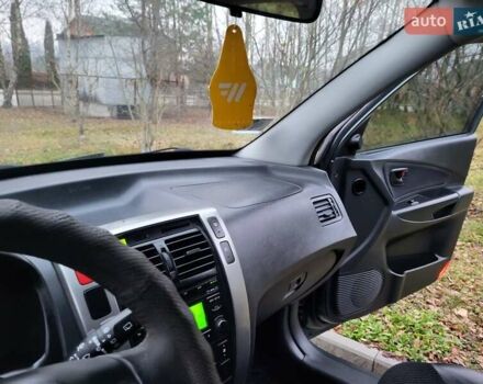 Чорний Хендай Туксон, об'ємом двигуна 1.98 л та пробігом 160 тис. км за 10300 $, фото 101 на Automoto.ua