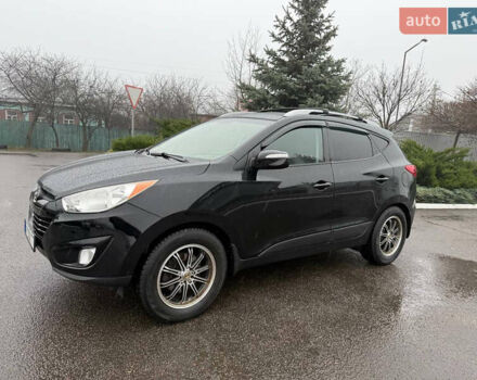 Черный Хендай Туксон, объемом двигателя 2.4 л и пробегом 143 тыс. км за 12000 $, фото 9 на Automoto.ua