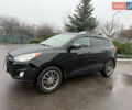 Черный Хендай Туксон, объемом двигателя 2.4 л и пробегом 143 тыс. км за 12000 $, фото 9 на Automoto.ua