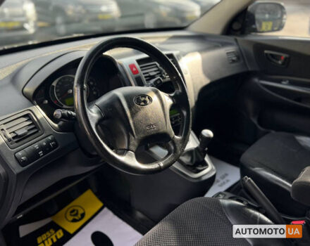 Черный Хендай Туксон, объемом двигателя 2 л и пробегом 178 тыс. км за 9600 $, фото 8 на Automoto.ua