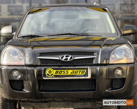 Черный Хендай Туксон, объемом двигателя 2 л и пробегом 178 тыс. км за 9600 $, фото 1 на Automoto.ua