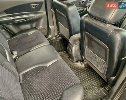 Черный Хендай Туксон, объемом двигателя 1.98 л и пробегом 158 тыс. км за 8200 $, фото 11 на Automoto.ua