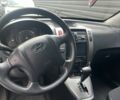 Черный Хендай Туксон, объемом двигателя 2 л и пробегом 181 тыс. км за 11000 $, фото 10 на Automoto.ua