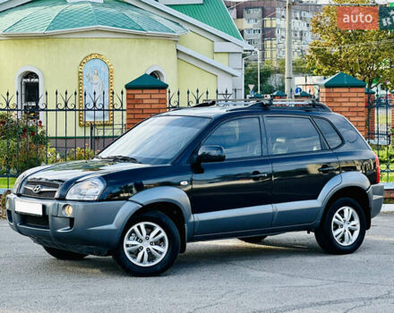 Черный Хендай Туксон, объемом двигателя 2 л и пробегом 119 тыс. км за 9600 $, фото 2 на Automoto.ua
