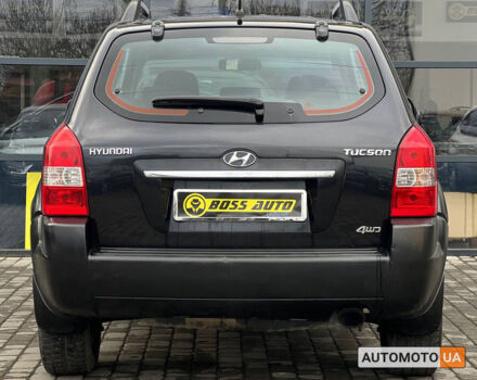 Черный Хендай Туксон, объемом двигателя 2 л и пробегом 178 тыс. км за 9600 $, фото 4 на Automoto.ua