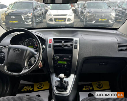 Черный Хендай Туксон, объемом двигателя 2 л и пробегом 178 тыс. км за 9600 $, фото 13 на Automoto.ua