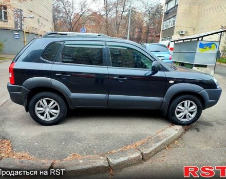 Черный Хендай Туксон, объемом двигателя 2 л и пробегом 258 тыс. км за 9000 $, фото 1 на Automoto.ua