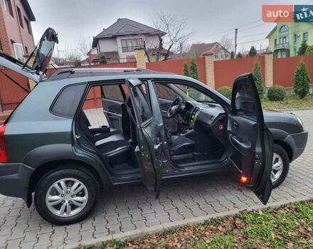 Чорний Хендай Туксон, об'ємом двигуна 1.98 л та пробігом 160 тис. км за 10300 $, фото 77 на Automoto.ua