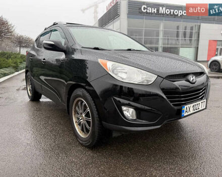 Черный Хендай Туксон, объемом двигателя 2.4 л и пробегом 143 тыс. км за 12000 $, фото 4 на Automoto.ua