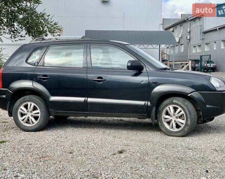 Черный Хендай Туксон, объемом двигателя 1.98 л и пробегом 158 тыс. км за 8200 $, фото 2 на Automoto.ua