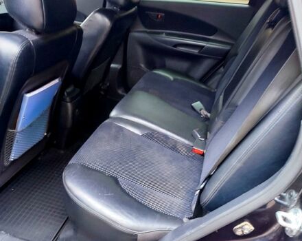 Черный Хендай Туксон, объемом двигателя 2 л и пробегом 258 тыс. км за 9000 $, фото 4 на Automoto.ua