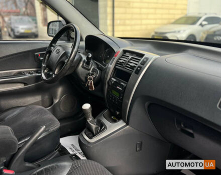 Черный Хендай Туксон, объемом двигателя 2 л и пробегом 178 тыс. км за 9600 $, фото 17 на Automoto.ua