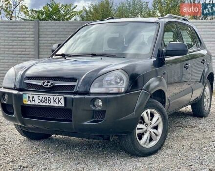 Черный Хендай Туксон, объемом двигателя 1.98 л и пробегом 158 тыс. км за 8200 $, фото 4 на Automoto.ua