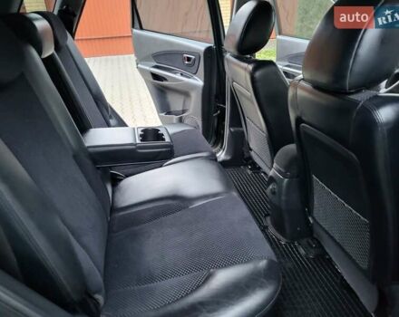 Чорний Хендай Туксон, об'ємом двигуна 1.98 л та пробігом 160 тис. км за 10300 $, фото 115 на Automoto.ua