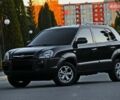 Чорний Хендай Туксон, об'ємом двигуна 2 л та пробігом 127 тис. км за 10800 $, фото 1 на Automoto.ua