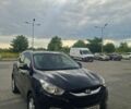 Чорний Хендай Туксон, об'ємом двигуна 2 л та пробігом 175 тис. км за 12900 $, фото 1 на Automoto.ua