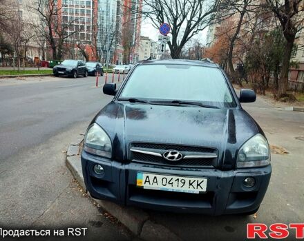 Черный Хендай Туксон, объемом двигателя 2 л и пробегом 258 тыс. км за 9000 $, фото 2 на Automoto.ua