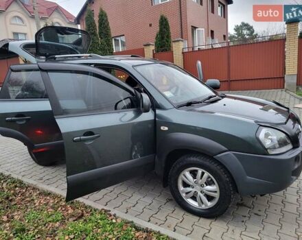 Чорний Хендай Туксон, об'ємом двигуна 1.98 л та пробігом 160 тис. км за 10300 $, фото 78 на Automoto.ua