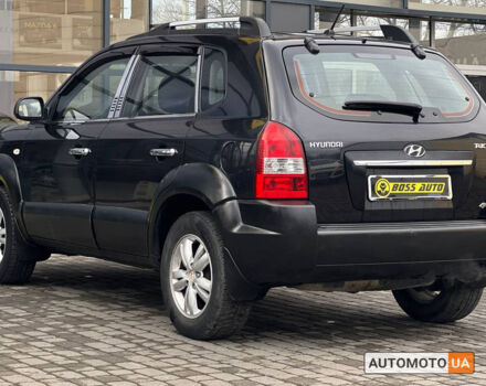 Черный Хендай Туксон, объемом двигателя 2 л и пробегом 178 тыс. км за 9600 $, фото 3 на Automoto.ua