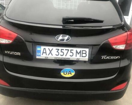 Черный Хендай Туксон, объемом двигателя 2.4 л и пробегом 132 тыс. км за 12900 $, фото 6 на Automoto.ua