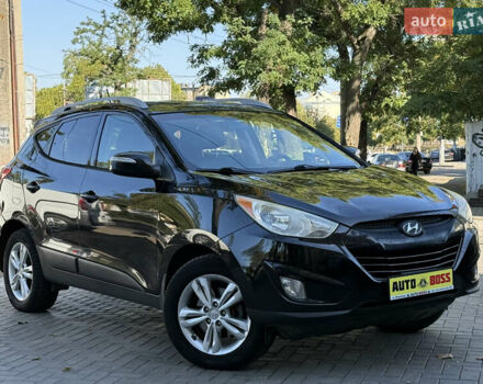 Черный Хендай Туксон, объемом двигателя 2.36 л и пробегом 299 тыс. км за 9800 $, фото 5 на Automoto.ua