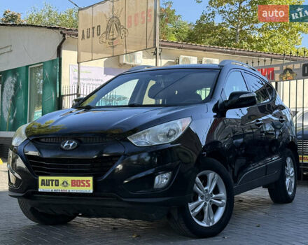 Черный Хендай Туксон, объемом двигателя 2.36 л и пробегом 299 тыс. км за 9800 $, фото 1 на Automoto.ua