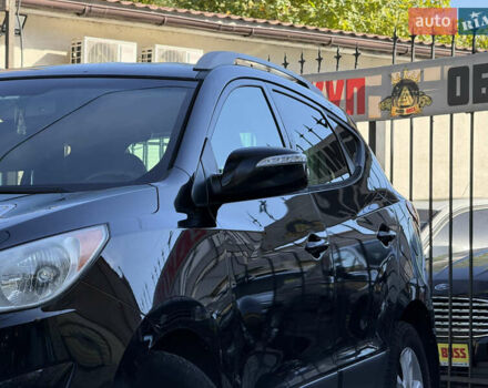 Черный Хендай Туксон, объемом двигателя 2.36 л и пробегом 299 тыс. км за 9800 $, фото 3 на Automoto.ua