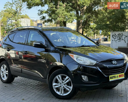 Черный Хендай Туксон, объемом двигателя 2.36 л и пробегом 299 тыс. км за 9800 $, фото 4 на Automoto.ua