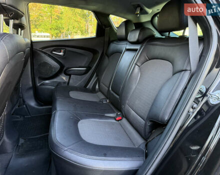 Черный Хендай Туксон, объемом двигателя 2.36 л и пробегом 299 тыс. км за 9800 $, фото 27 на Automoto.ua