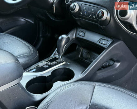 Черный Хендай Туксон, объемом двигателя 2.36 л и пробегом 299 тыс. км за 9800 $, фото 25 на Automoto.ua