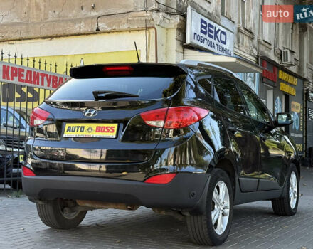 Черный Хендай Туксон, объемом двигателя 2.36 л и пробегом 299 тыс. км за 9800 $, фото 10 на Automoto.ua
