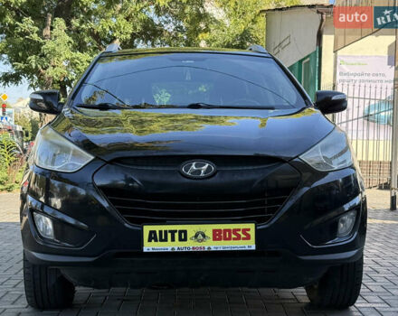 Черный Хендай Туксон, объемом двигателя 2.36 л и пробегом 299 тыс. км за 9800 $, фото 6 на Automoto.ua