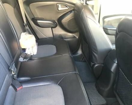 Черный Хендай Туксон, объемом двигателя 2.4 л и пробегом 132 тыс. км за 12900 $, фото 5 на Automoto.ua