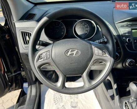 Чорний Хендай Туксон, об'ємом двигуна 2 л та пробігом 164 тис. км за 11490 $, фото 15 на Automoto.ua