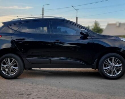 Черный Хендай Туксон, объемом двигателя 2.4 л и пробегом 130 тыс. км за 12400 $, фото 6 на Automoto.ua