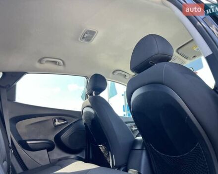 Чорний Хендай Туксон, об'ємом двигуна 2 л та пробігом 164 тис. км за 11490 $, фото 28 на Automoto.ua