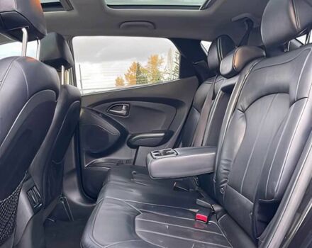 Черный Хендай Туксон, объемом двигателя 2.4 л и пробегом 80 тыс. км за 13000 $, фото 10 на Automoto.ua