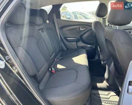 Чорний Хендай Туксон, об'ємом двигуна 2 л та пробігом 164 тис. км за 11490 $, фото 26 на Automoto.ua